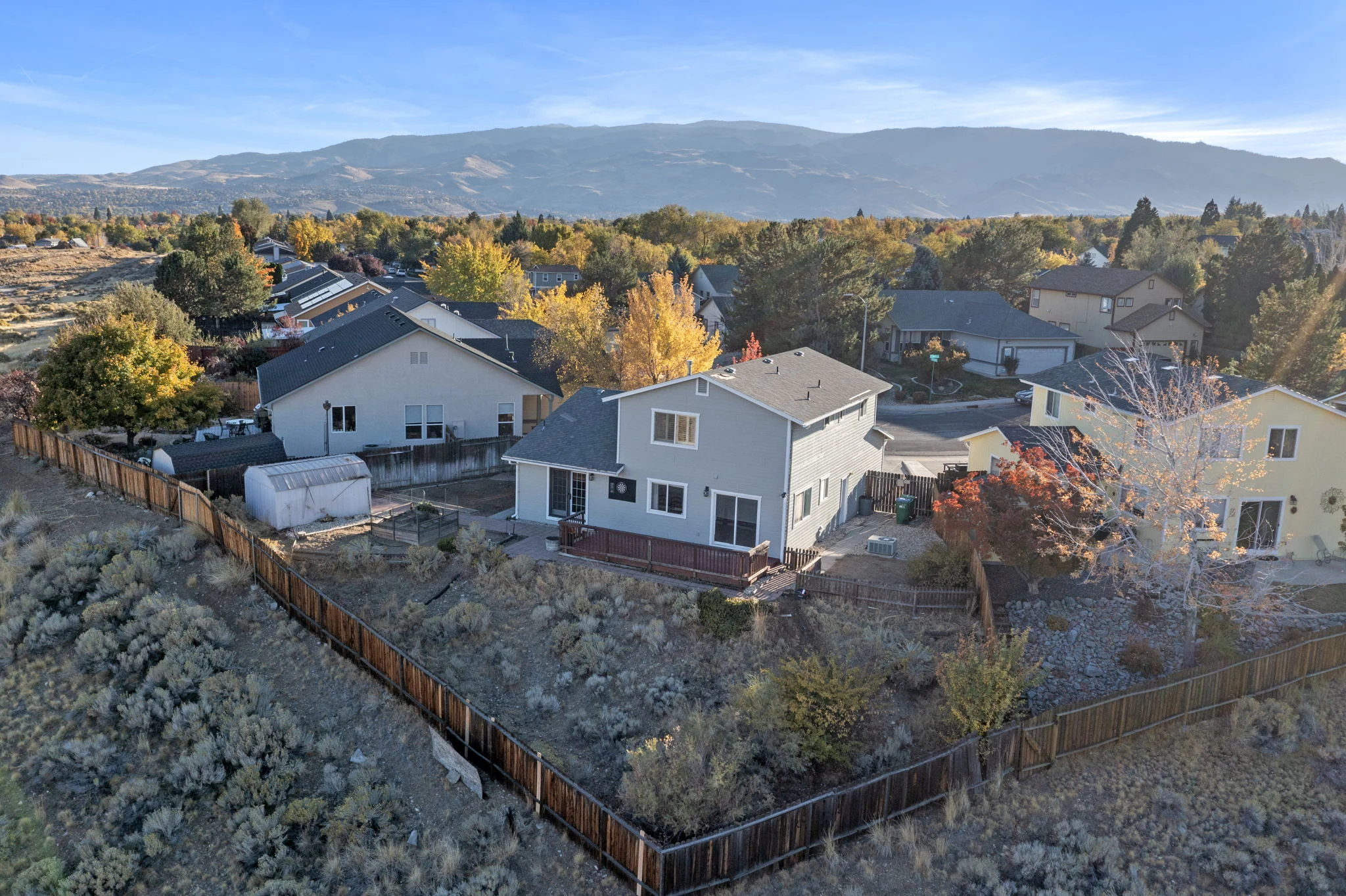 Rear aerial view with mountains in the distance